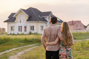 Couple stares at home they intend to buy, unaware of potential foundation disasters looming over the horizon